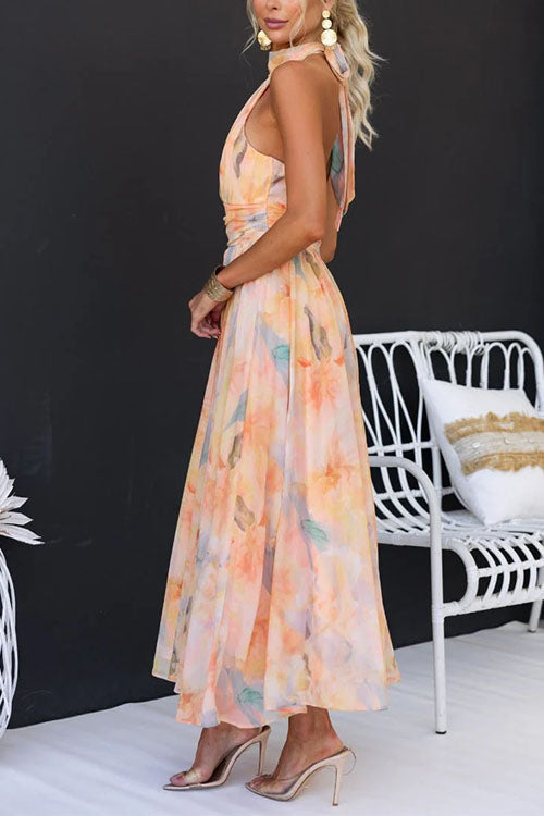 Erlinda - Vestido Maxi com Estampa em Aquarela  Decote Halter e Costas Abertas